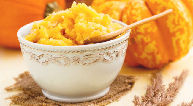 White bowl containing fresh pureed pumpkin